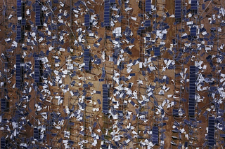 Solar panel debris is seen scattered in a solar panel field in the aftermath of Hurricane Maria in Humacao, Puerto Rico. Photo: Getty
